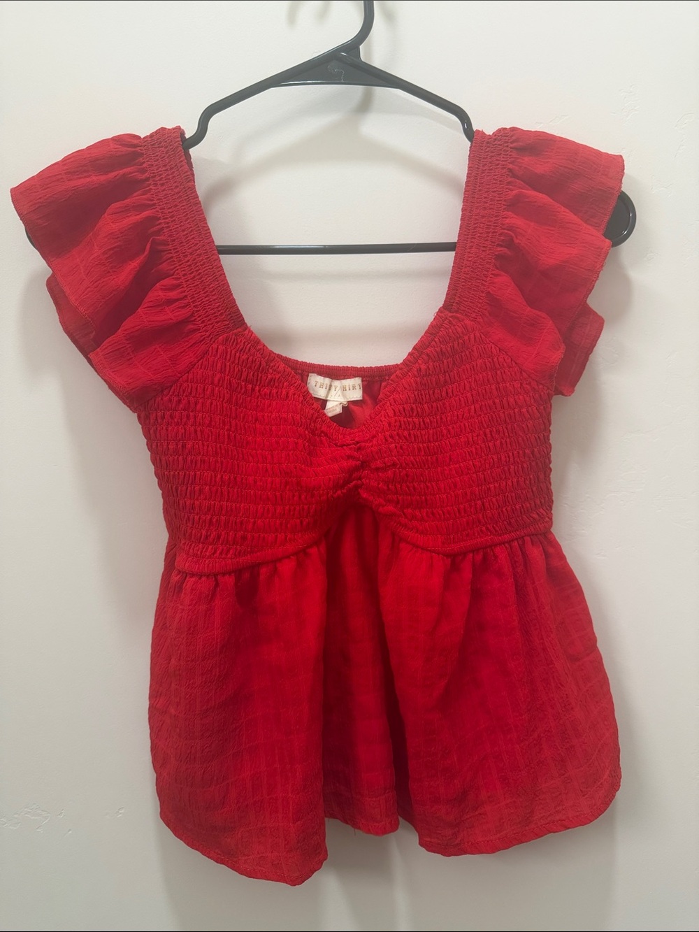 Women’s Red Smocked Peplum Tunic with Ruffle Sleeves